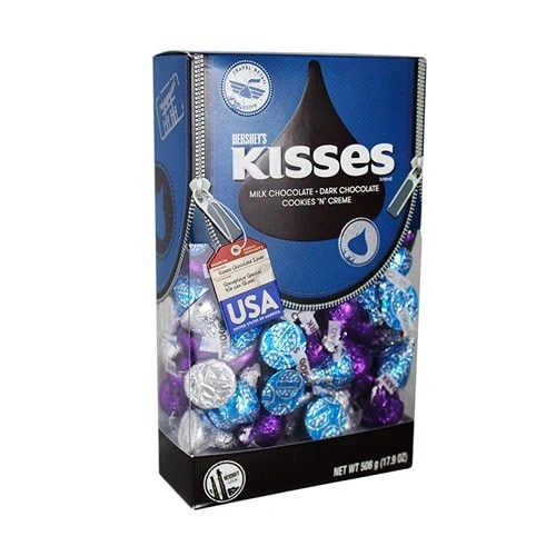 Panoramic windowed paperboard package with dynamic graphics Panoramic windowed paperboard package with dynamic graphics